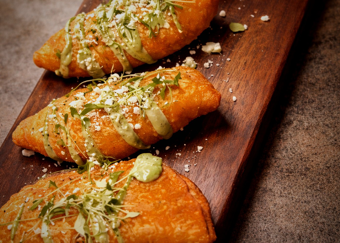 Crispy beef empanadas with salsa verde